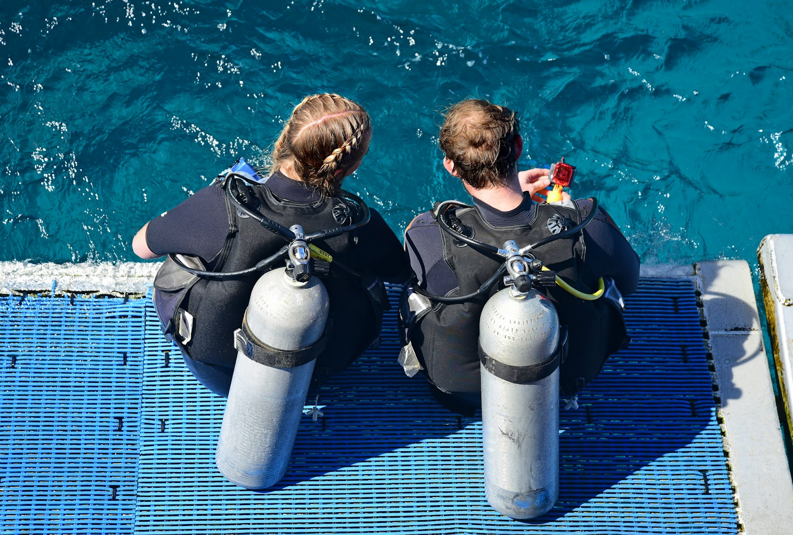 Two divers preparing to enter the Red Sea